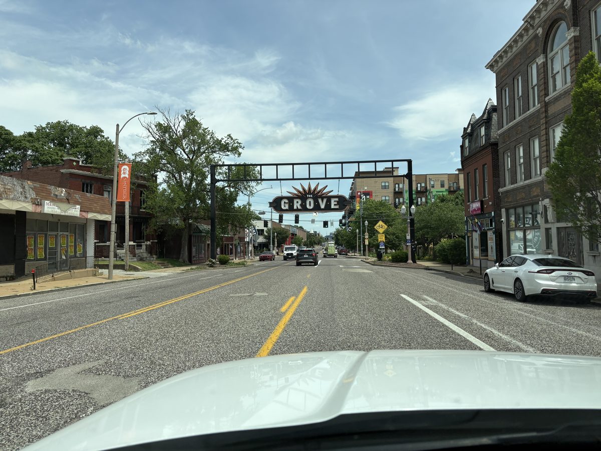 The Grove St. Louis on Manchester Avenue — Forest Park Southeast neighborhood gateway arch, pre-war brick commercial corridor, 63110