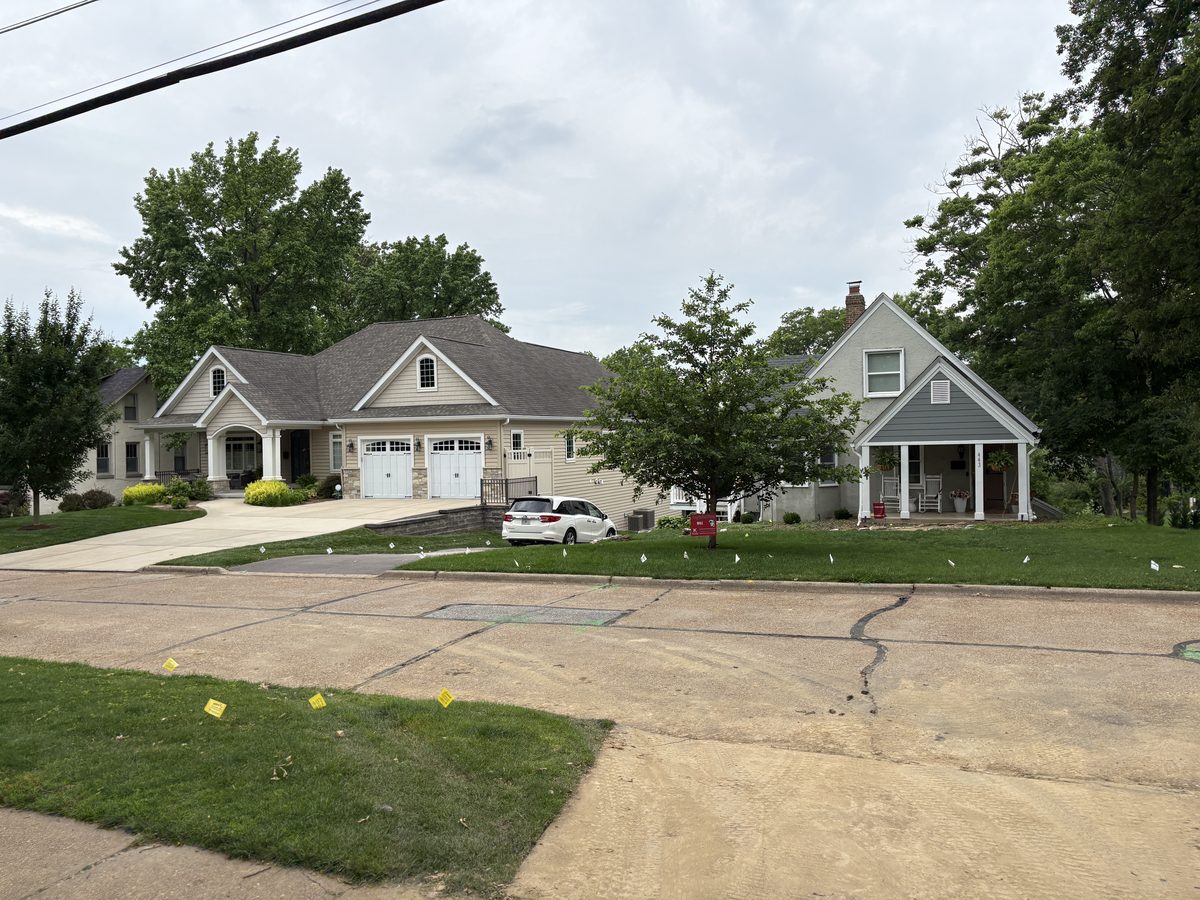 Kirkwood MO homes for sale — quiet cul-de-sac on North Van Buren Avenue, 1960s-70s ranch homes on large lots with mature oak canopy, 63122 inner-ring suburb St. Louis County