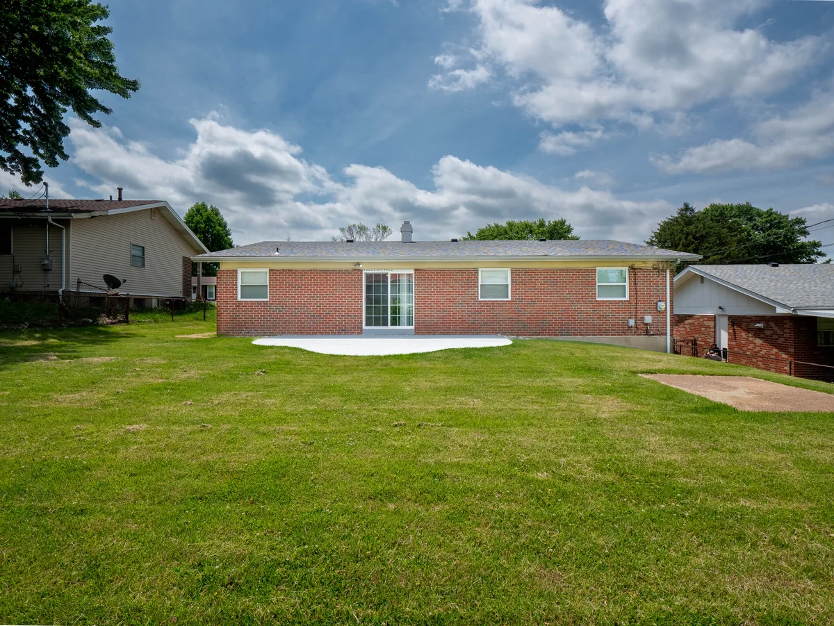 Ranch rear — brick, large lot, patio