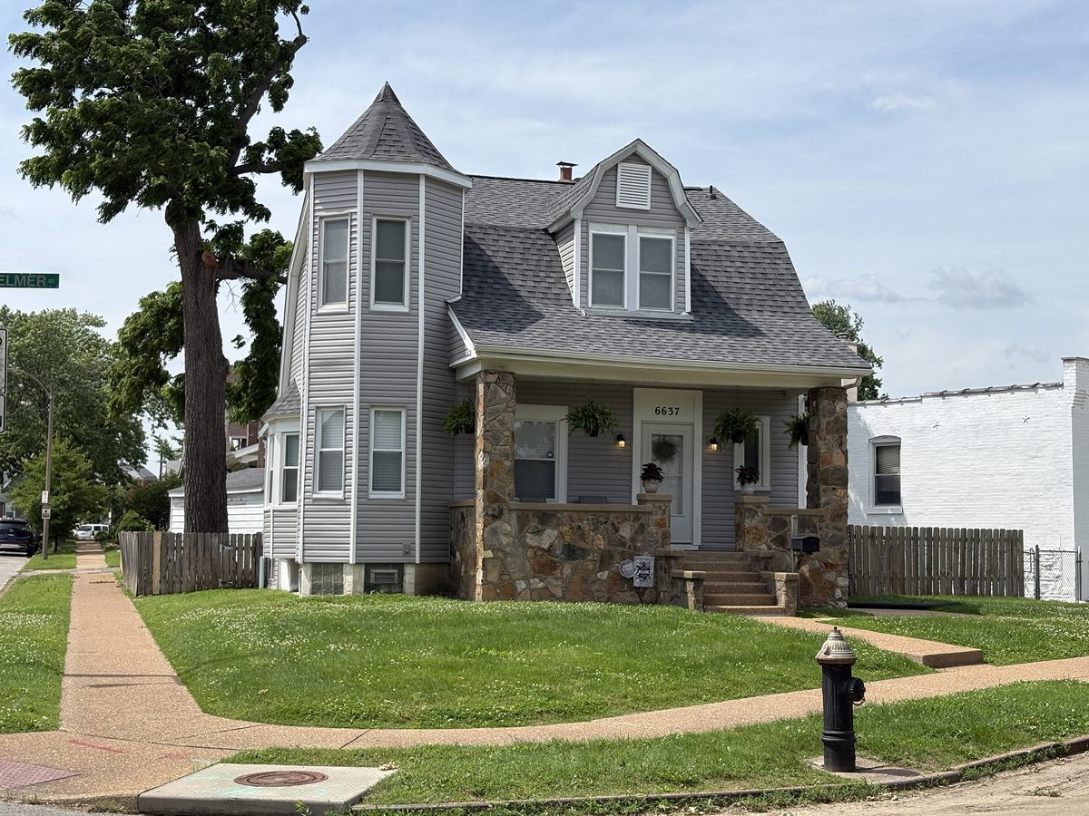 Princeton Heights St. Louis homes for sale — early 1900s brick corner home with stone porch and turret on Elmer Avenue, 63109
