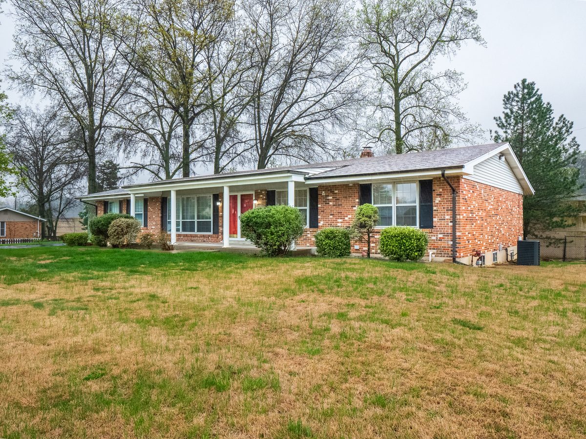 South County St. Louis homes for sale — full brick ranch with covered porch on large lot, the post-war housing stock buyers find across Mehlville, Affton, and Lemay